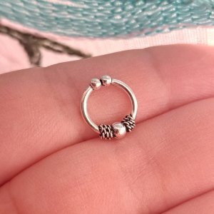 Piercing a presión bali